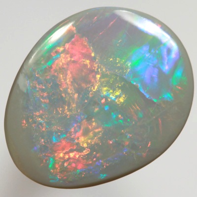 SOLID SEMI BLACK OPAL Bright rolling flashes from red to turquoise and more SEE VIDEO
